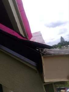 Gutter Guard Shoved Under Shingle