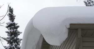 Heavy Snow On Gutter