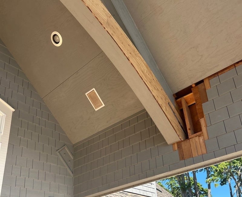 shingle siding removed for glulam beam repalcement