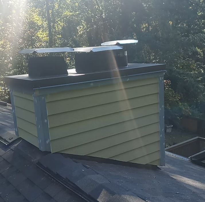 chimney chase over brick chimney