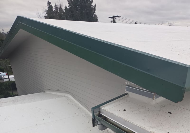 low slope roof metal fascia cap