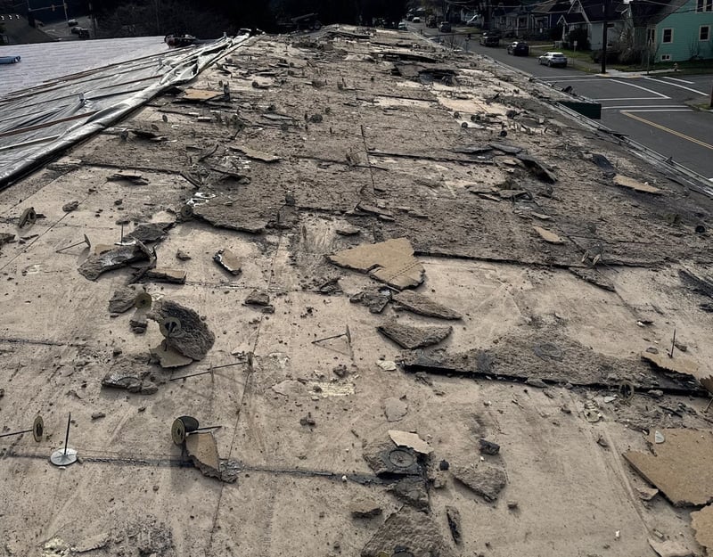 torch down removal with foam directly underneath