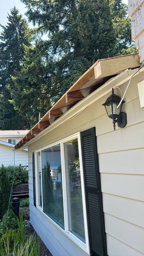 built-in gutter conversion- the rafters are cut