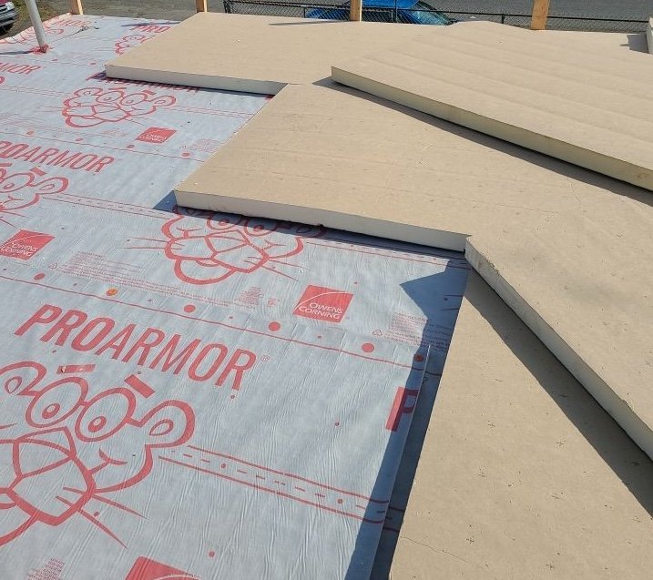 first layer of polyiso flat roof
