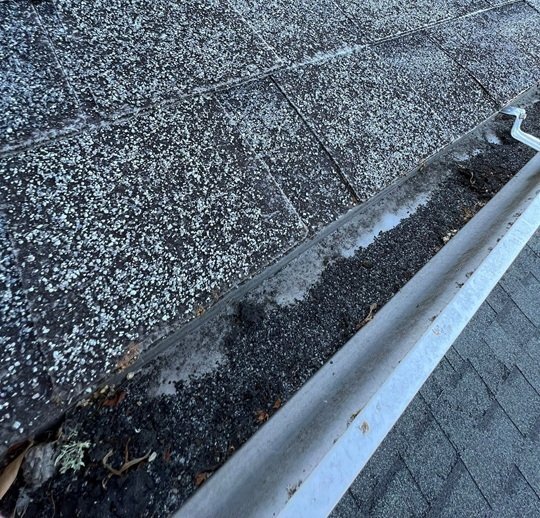 granule loss with granules in gutter