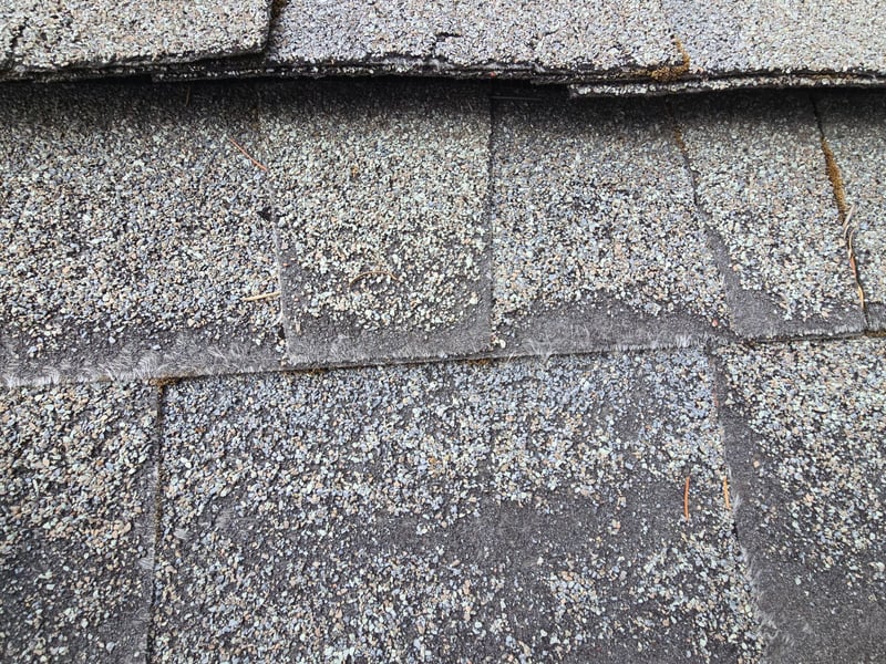 low slope roof worn out shingles