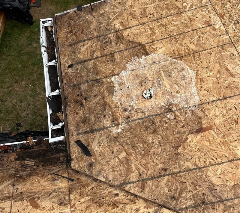 rotting wood at edge of roof and valley