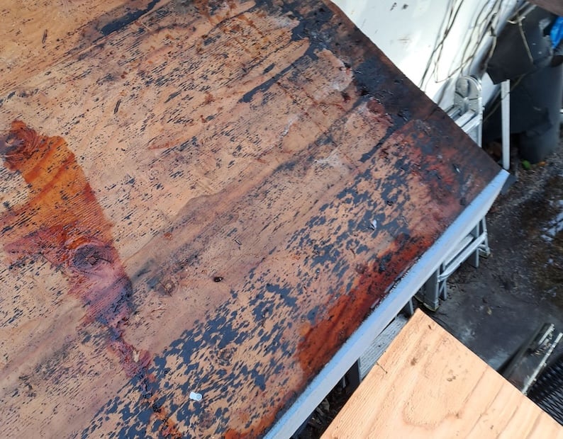 rotting wood roof decking