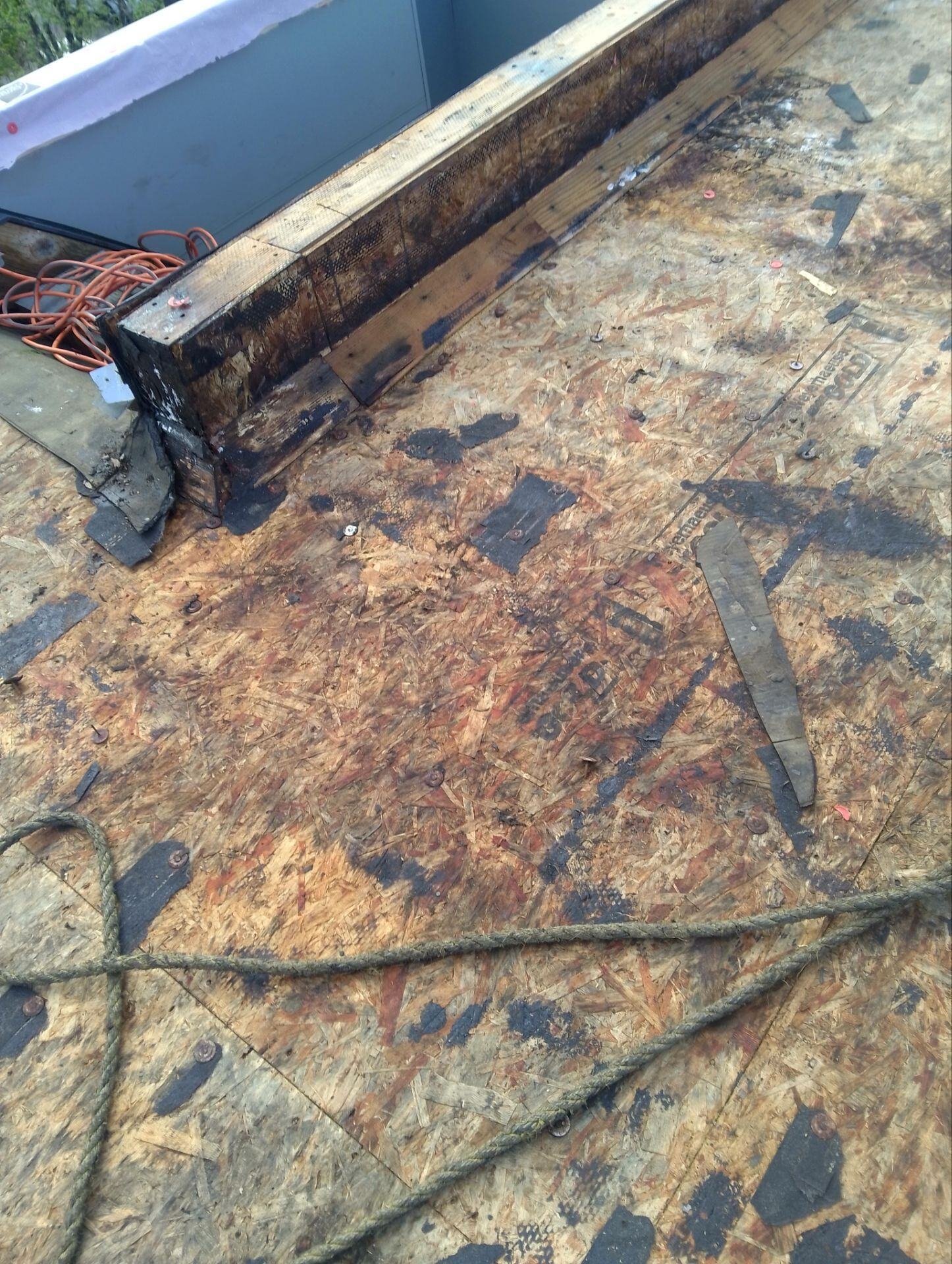 rotting wood rooftop deck
