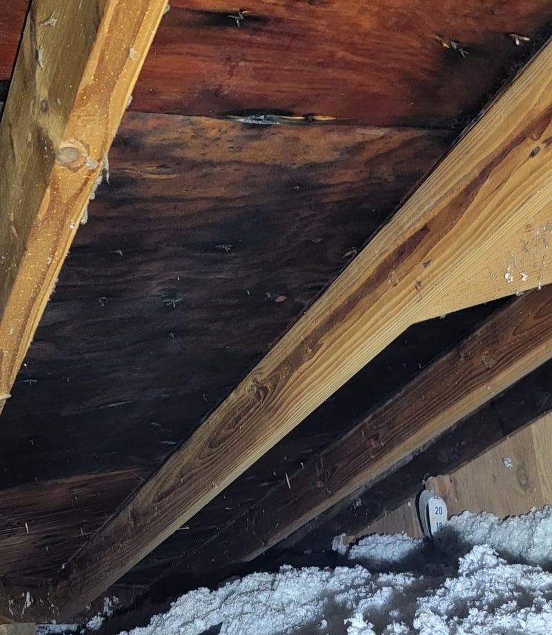 saturated roof decking caused by built-in gutter