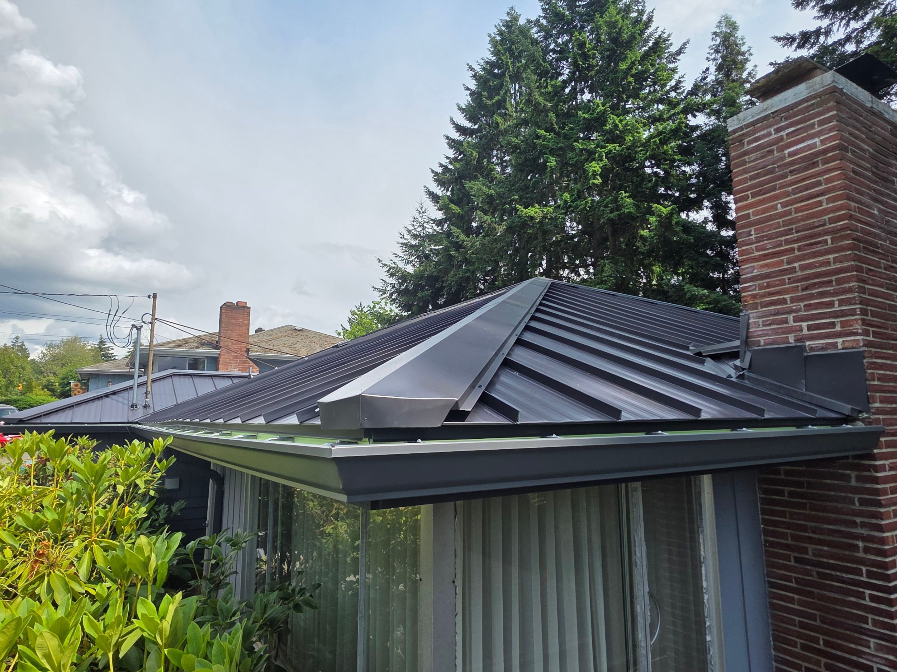 Black standing seam metal roof