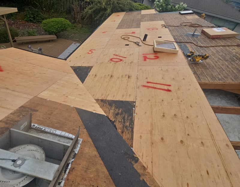 replacing sheathing on roof with built-in gutters