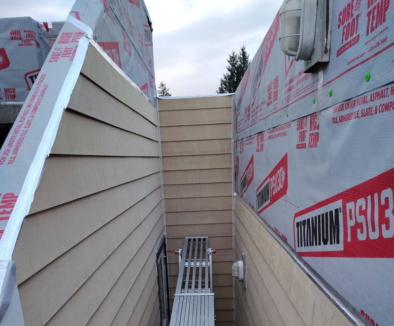 protective layer underneath siding on the wall