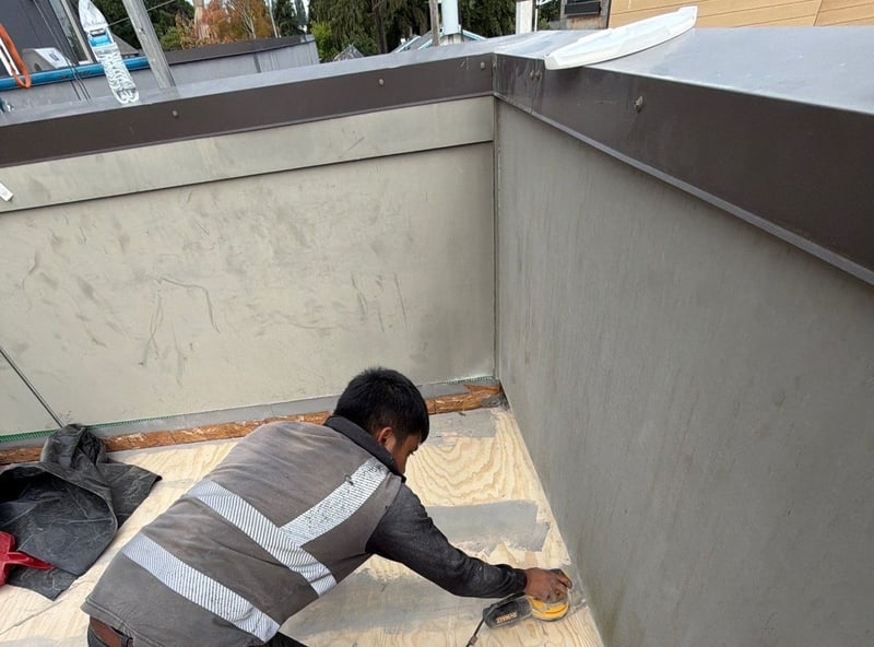 sanding down the plywood