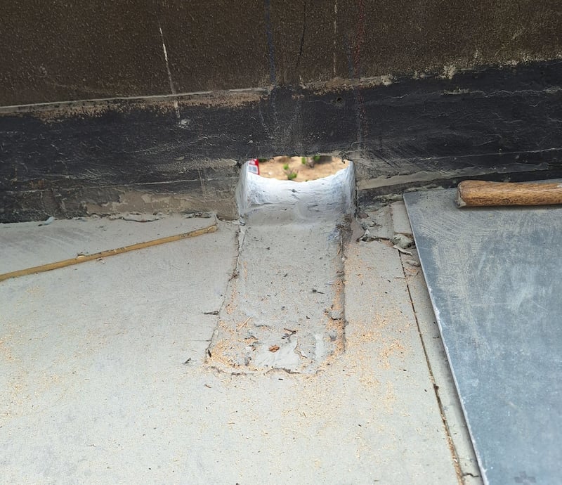 through wall scupper rooftop deck