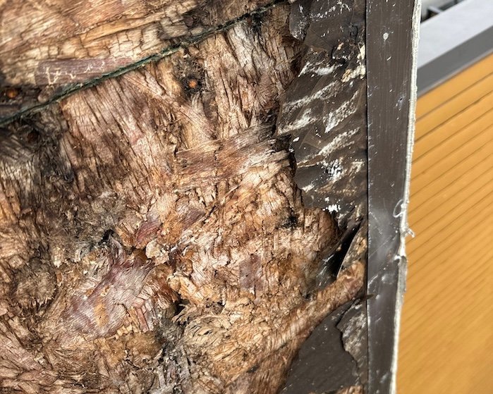 crumbling rotting wood from siding leak