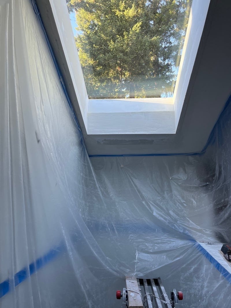 tarping inside during skylight installation