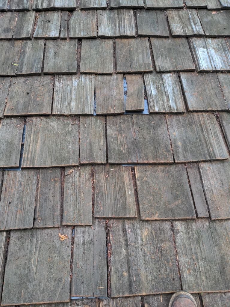 old wonky shake roof