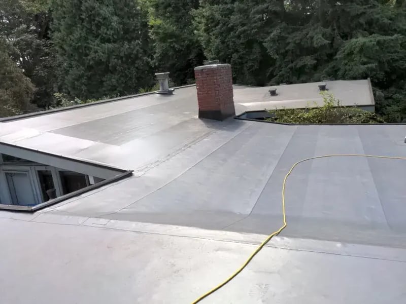 Before-and-After-Leaking-Torchdown-to-Waterproof-PVC-Single-Ply-RoofSmart-Seattle-Washington