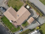 Milton: a drone view of the house before the old roof came off.