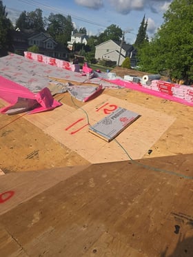 Seattle: new plywood patches and synthetic underlayment before shingles go down.