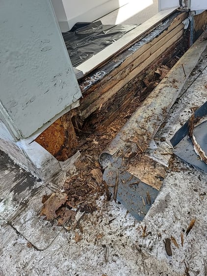 rotting wood in doorway from improper flashing installation